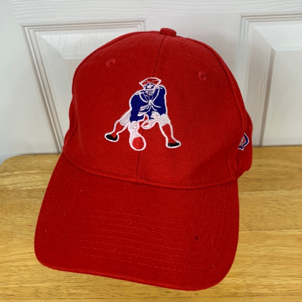 City Hunter red Patriots football hat with velcro strap. 100% acrylic